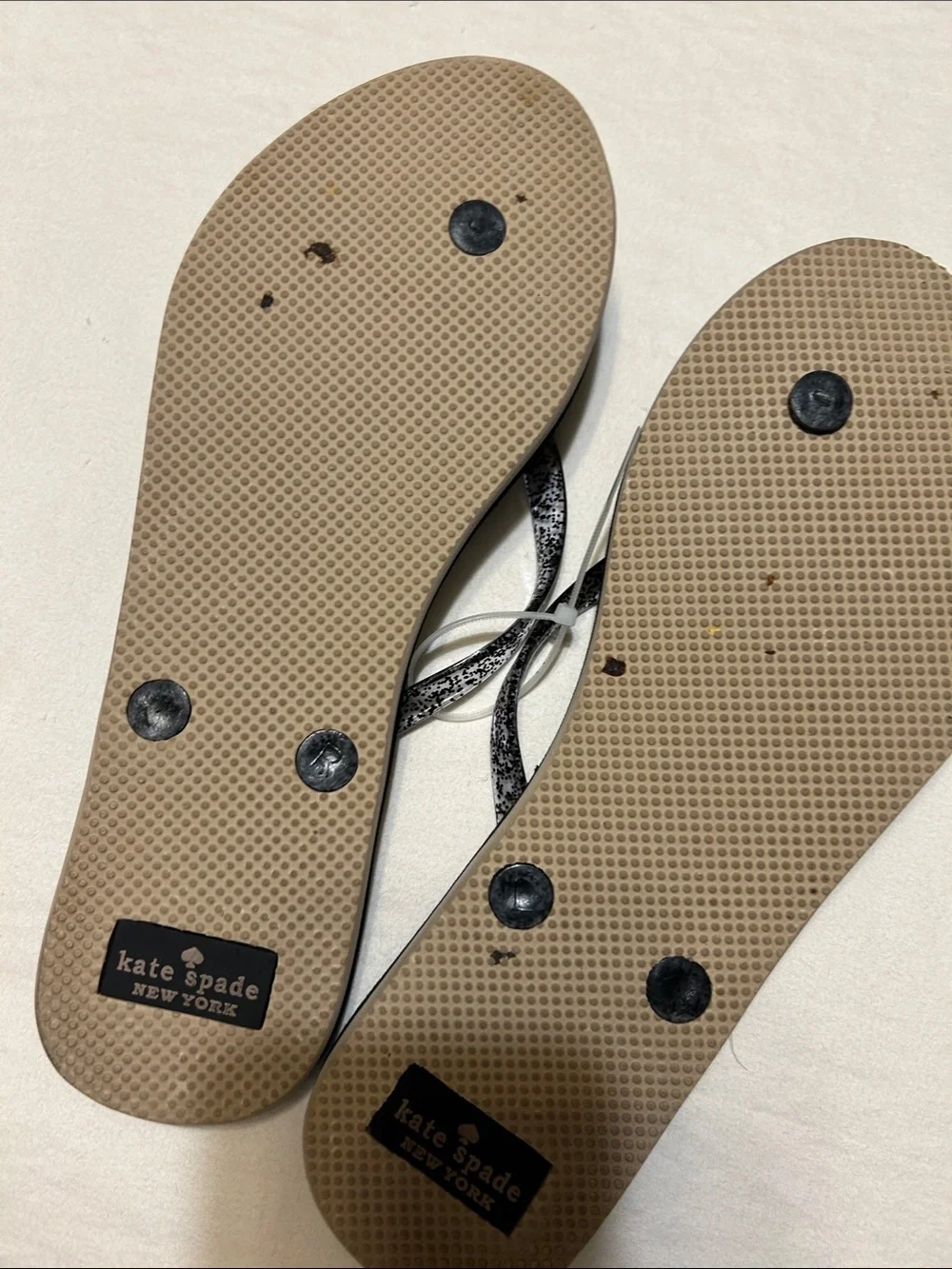 kate spade Black Leopard Print Flip Flop Sandals with Pink Floral Accent